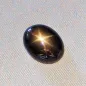 Mobile Preview: Echter Stern-Saphir im Cabochon-Schliff geschliffen mit 4,39 ct Gewicht, schwarzer Stein mit spektakulärem goldbraunen Stern - 11,86 x 9,24 x 3,58 mm
