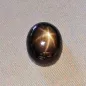 Mobile Preview: Echter Stern-Saphir im Cabochon-Schliff geschliffen mit 5,88 ct Gewicht, schwarzer Stein mit spektakulärem goldbraunen Stern - 11,47 x 9,57 x 4,40 mm