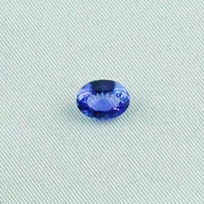 Seltener, echter blauer AAA Tansanit der Spitzenklasse mit 1,51 ct - Echte Edelsteine online kaufen bei der Opal-Schmiede! Steinmaße: 8,49 x 6,50 x 3,79 mm