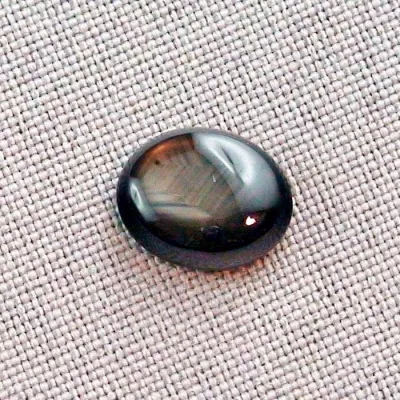 Echter schwarzer Stern Saphir im Cabochon-Schliff mit 8,59 ct Gewicht, schwarzer Stein mit spektakulärem goldbraunen Stern - 13,57 x 11,12 x 4,64 mm 2