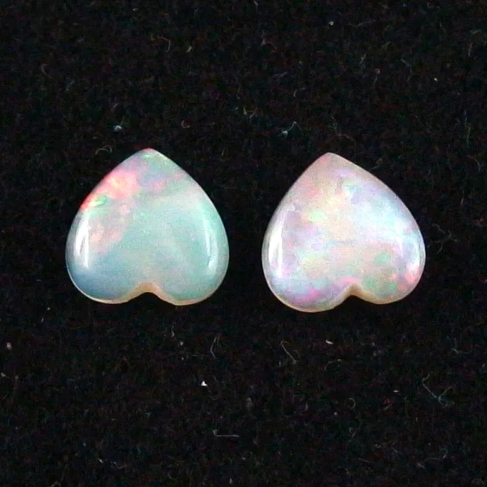 Herzform White Opal Pärchen aus Coober Pedy 0,90 ct. + 0,81 ct.