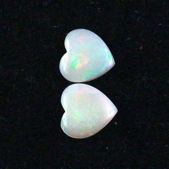 Herzform White Opal Pärchen aus Coober Pedy 0,83 ct. + 0,81 ct.