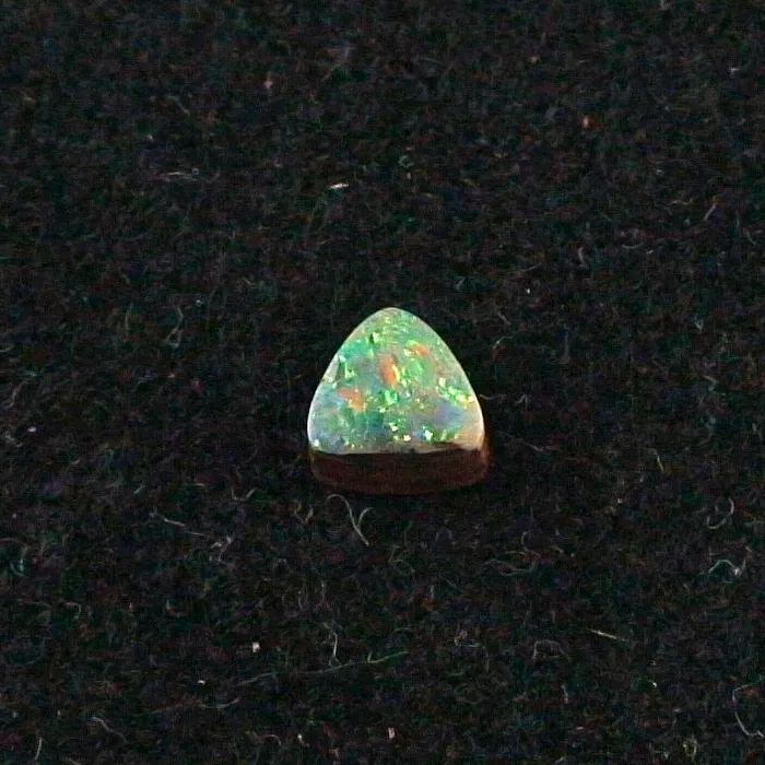 0,71 ct Boulder Opal 5,07 x 5,30 x 3,01 mm Opalstein Multicolor