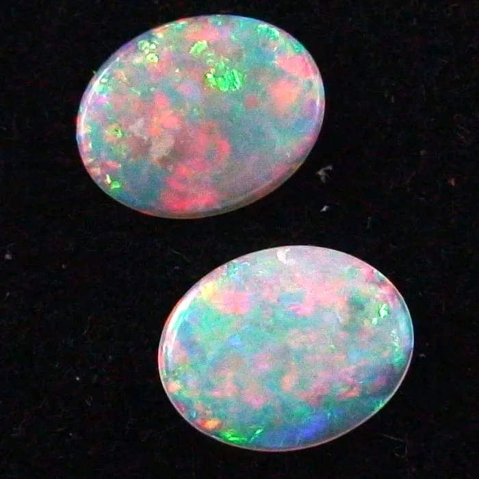 Black Crystal Opal Pärchen 0,95 ct. + 0,87 ct. Multicolor Vollopale