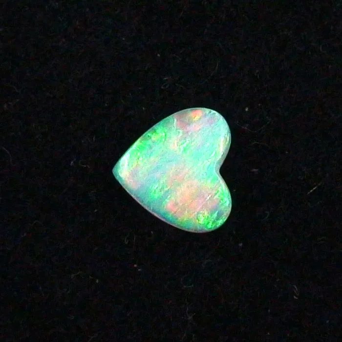 0,63 ct. Black Crystal Opal Multicolor 7,81 x 8,23 x 1,66 mm