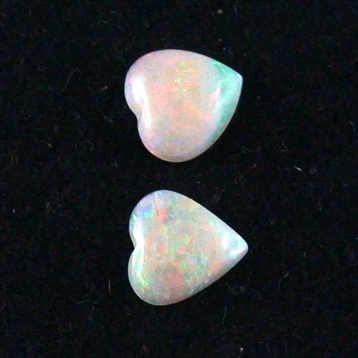 Herzform White Opal Pärchen aus Coober Pedy 0,97 ct. + 0,78 ct.