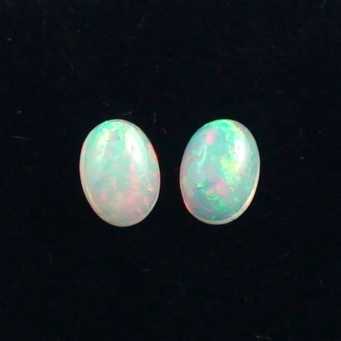 🦚 Welo Opal Pärchen 1,23 u. 1,25 ct Multicolor Opale Milchopale