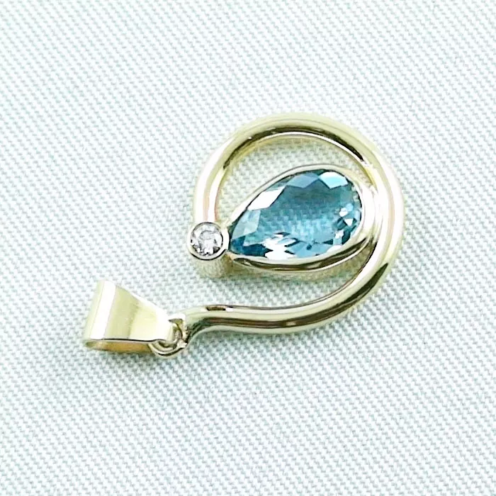 Auftragsarbeit: Eleganter Goldanhänger mit blauen Aquamarin und Diamant