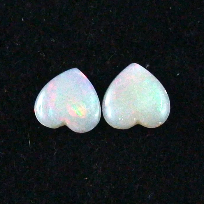 Herzform White Opal Pärchen aus Coober Pedy 0,83 ct. + 0,81 ct.