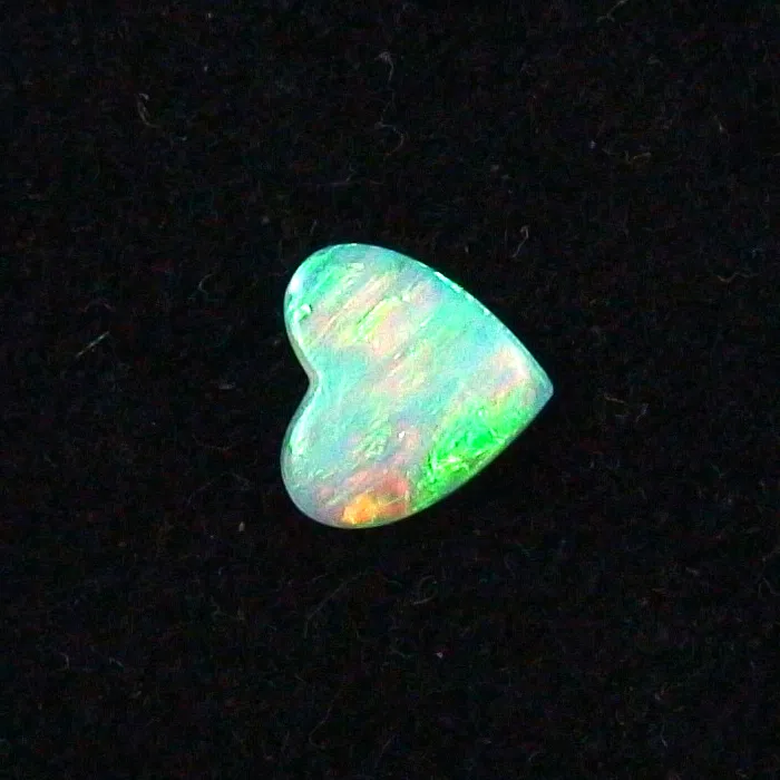 0,63 ct. Black Crystal Opal Multicolor 7,81 x 8,23 x 1,66 mm