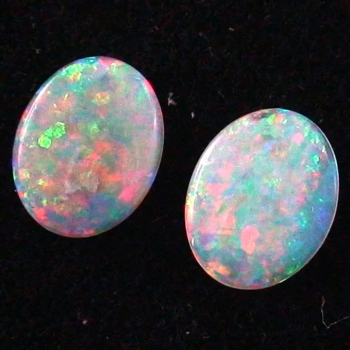 Black Crystal Opal Pärchen 0,95 ct. + 0,87 ct. Multicolor Vollopale
