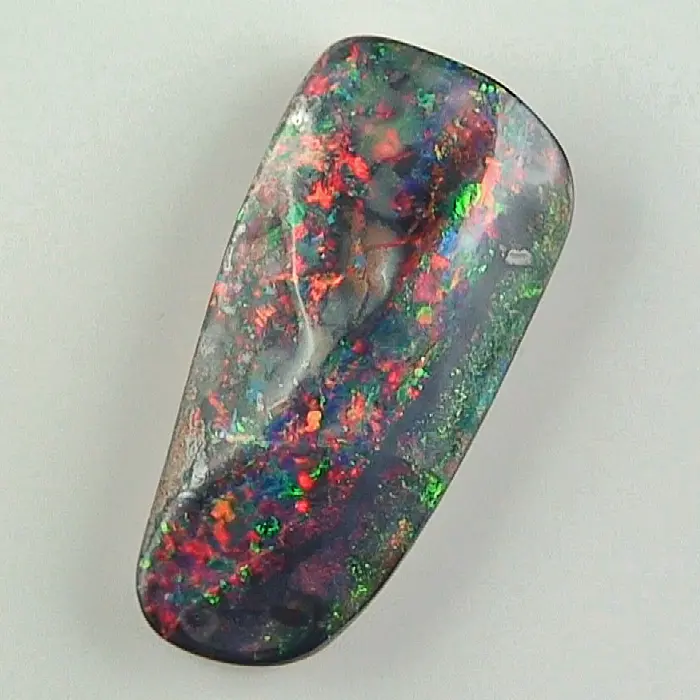 Black Boulder Opal 21,66 ct Brillantes Multicolor Investment Edelstein
