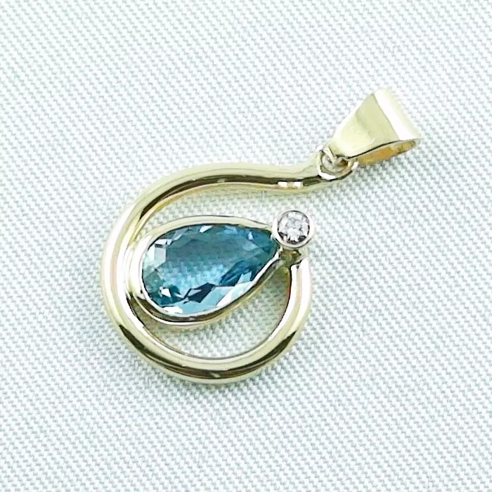 Auftragsarbeit: Eleganter Goldanhänger mit blauen Aquamarin und Diamant