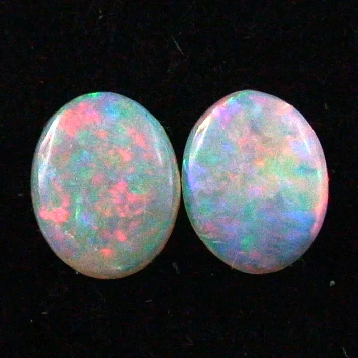 Black Crystal Opal Pärchen 1,52 ct. + 1,28 ct. Multicolor Vollopale