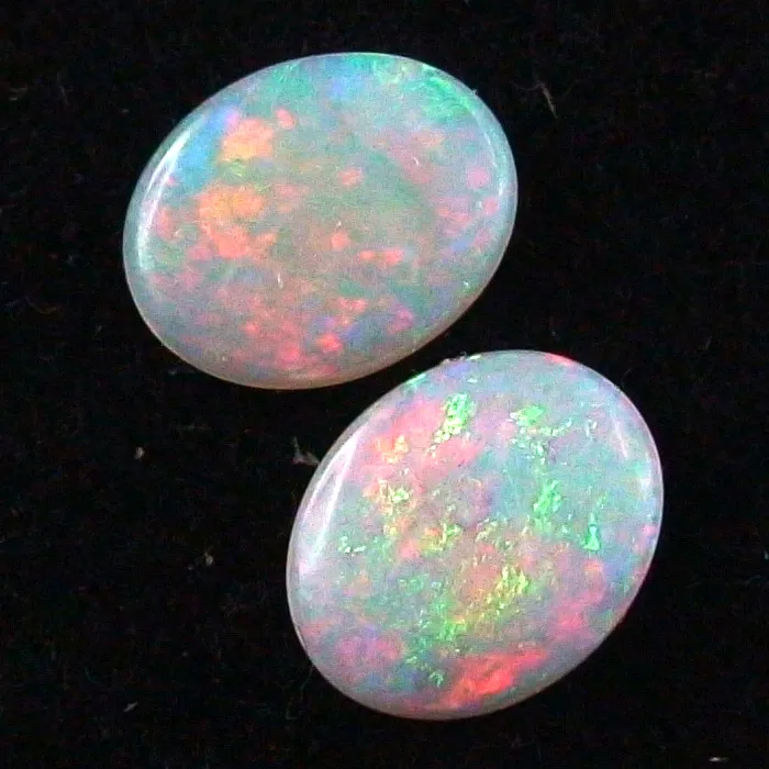 Black Crystal Opal Pärchen 1,01 ct. + 1,12 ct. Multicolor Vollopale