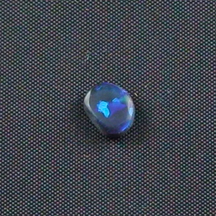 Black Opal 0,69 ct Blauer Lightning Ridge Opal Fancy 7,24 x 5,83 x 2,61 mm