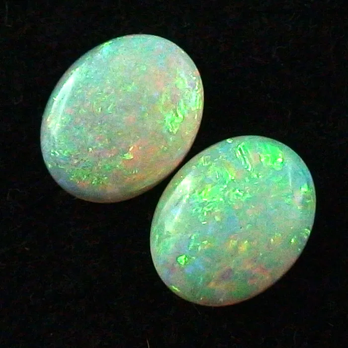 Black Crystal Opal Pärchen 1,50 ct. + 1,56 ct. Multicolor Vollopale