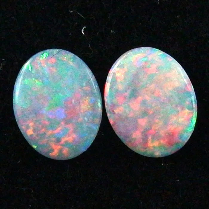 Black Crystal Opal Pärchen 0,76 ct. + 0,86 ct. Multicolor Vollopale
