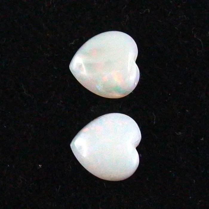Herzform White Opal Pärchen aus Coober Pedy 0,87 ct. + 0,95 ct.